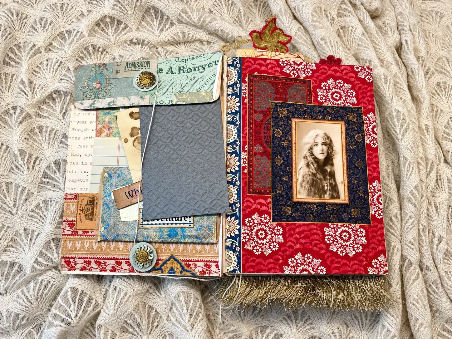 After the Wedding opened to blue paper pockets, layered ephemera and a framed vintage portrait on red patterned paper
