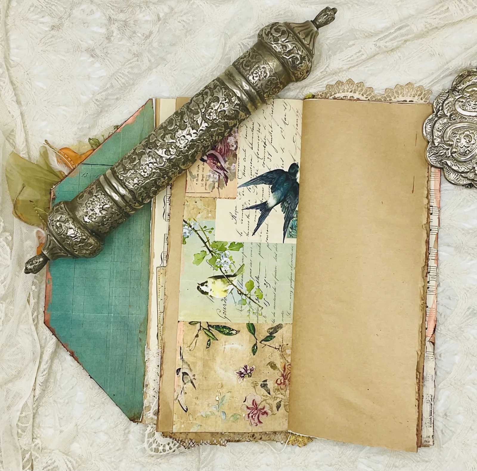 A layered bird collage beside a folded kraft page