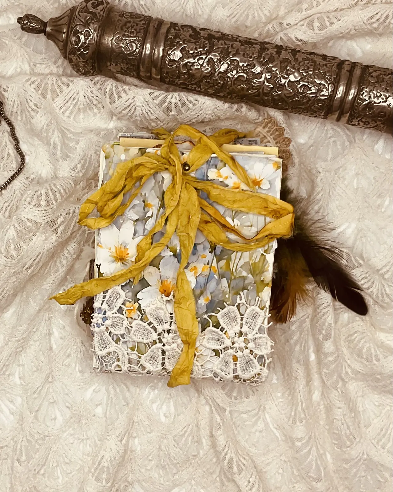 The closed reverse of The Book of Garden with lace, sari silk and handmade textile flowers