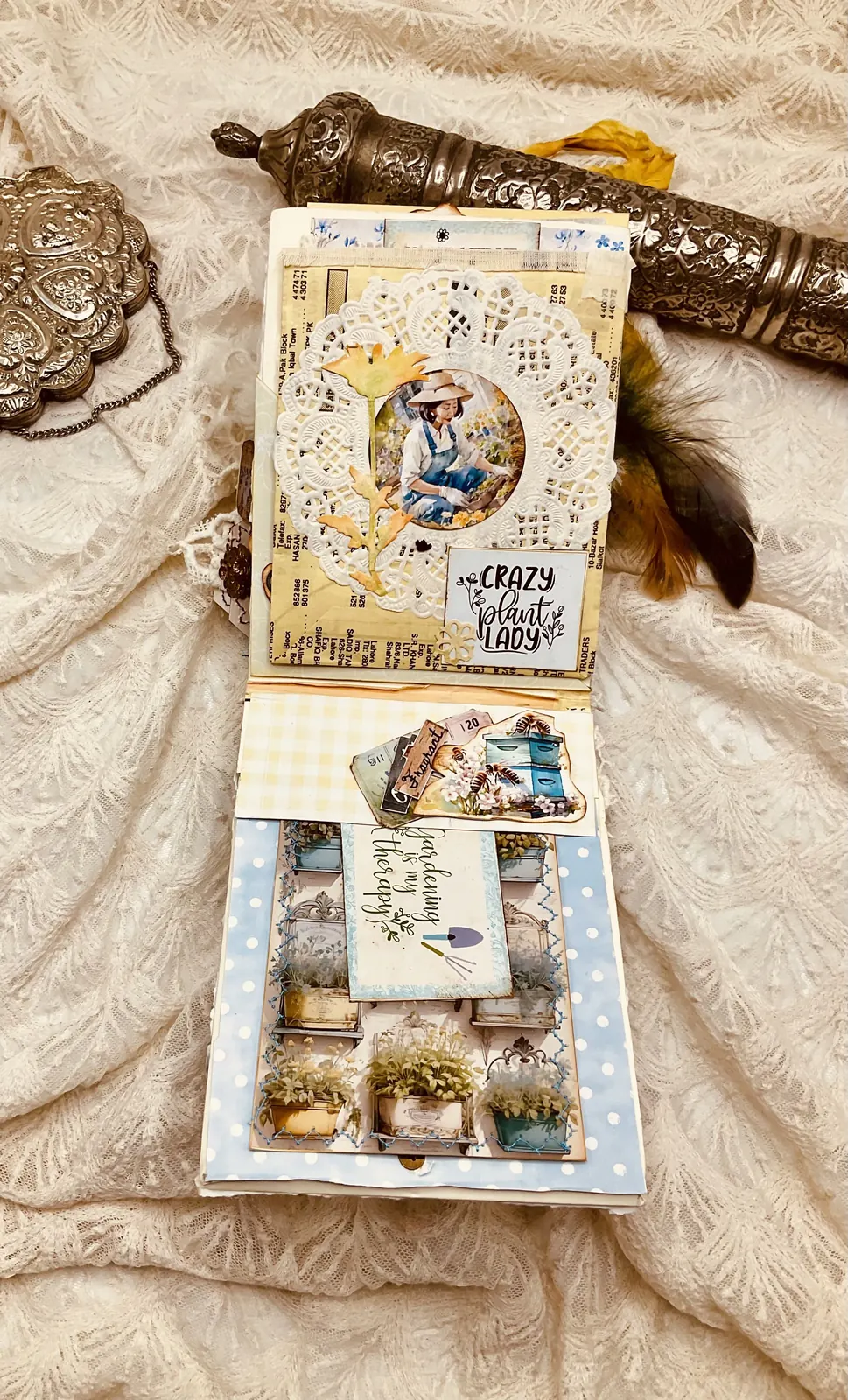 The Book of Garden opened to layered seed packets and a decorated lower pocket