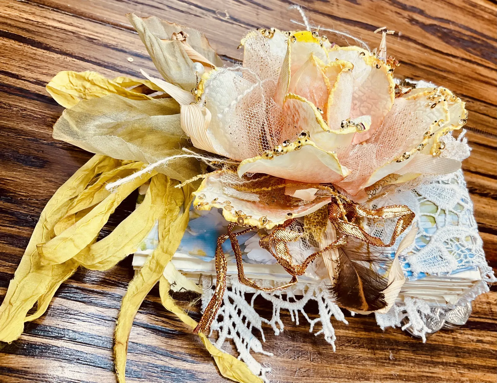 A landscape close view of the flower closure and yellow sari silk on The Book of Garden
