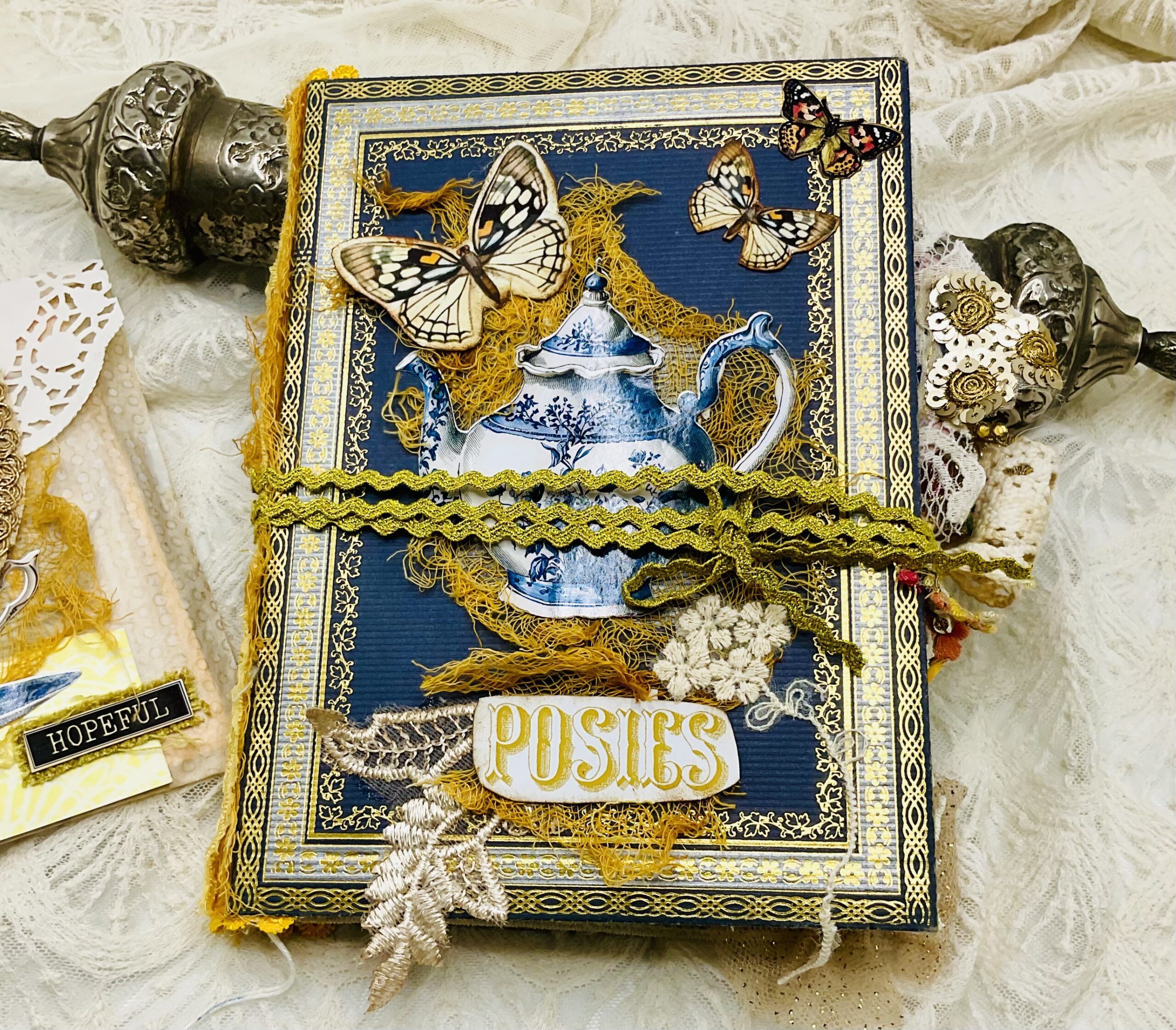 Tea-dyed page spread in Chinoiserie junk journal with warm golden tones