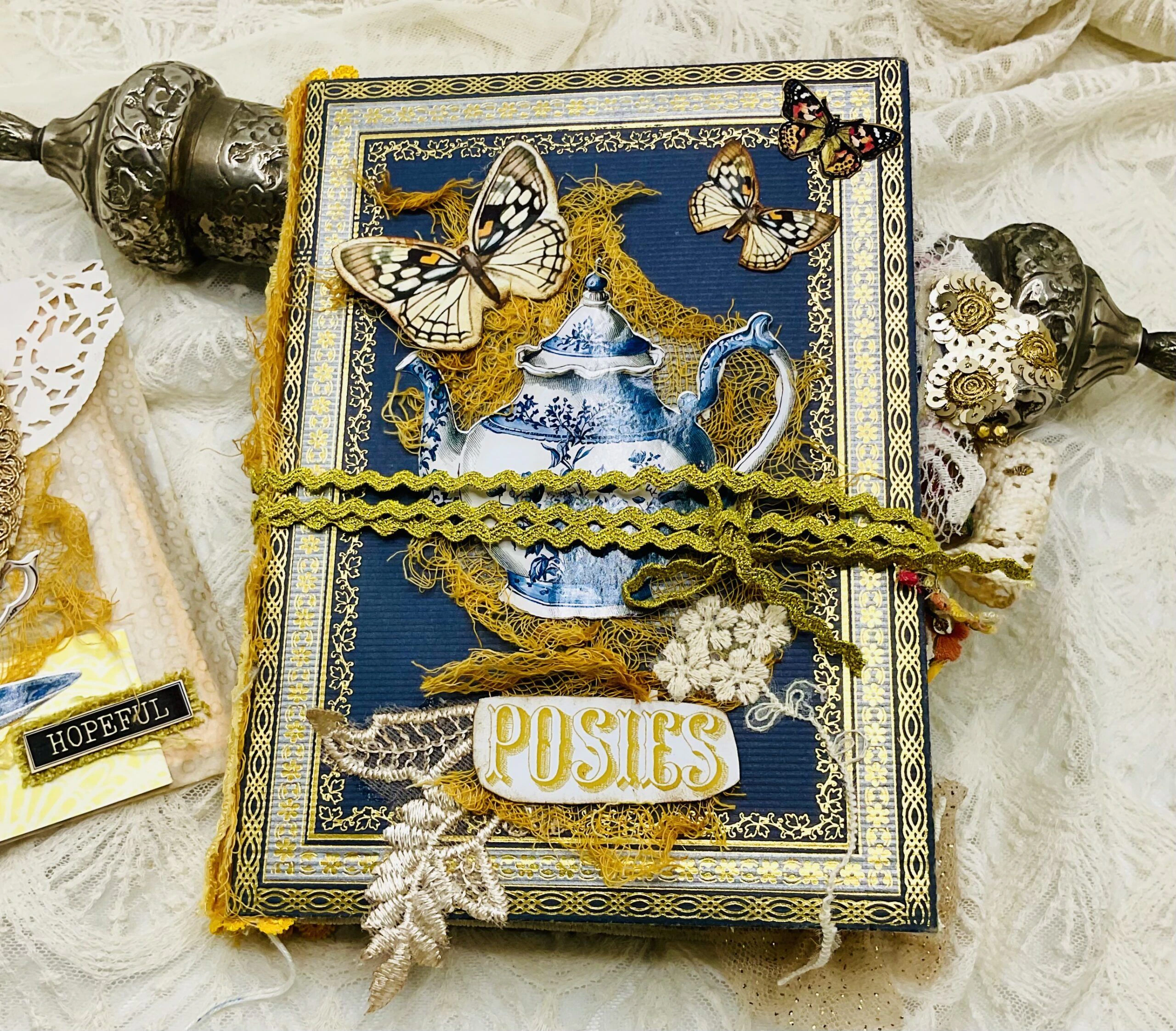 Tea-dyed page spread in Chinoiserie junk journal with warm golden tones