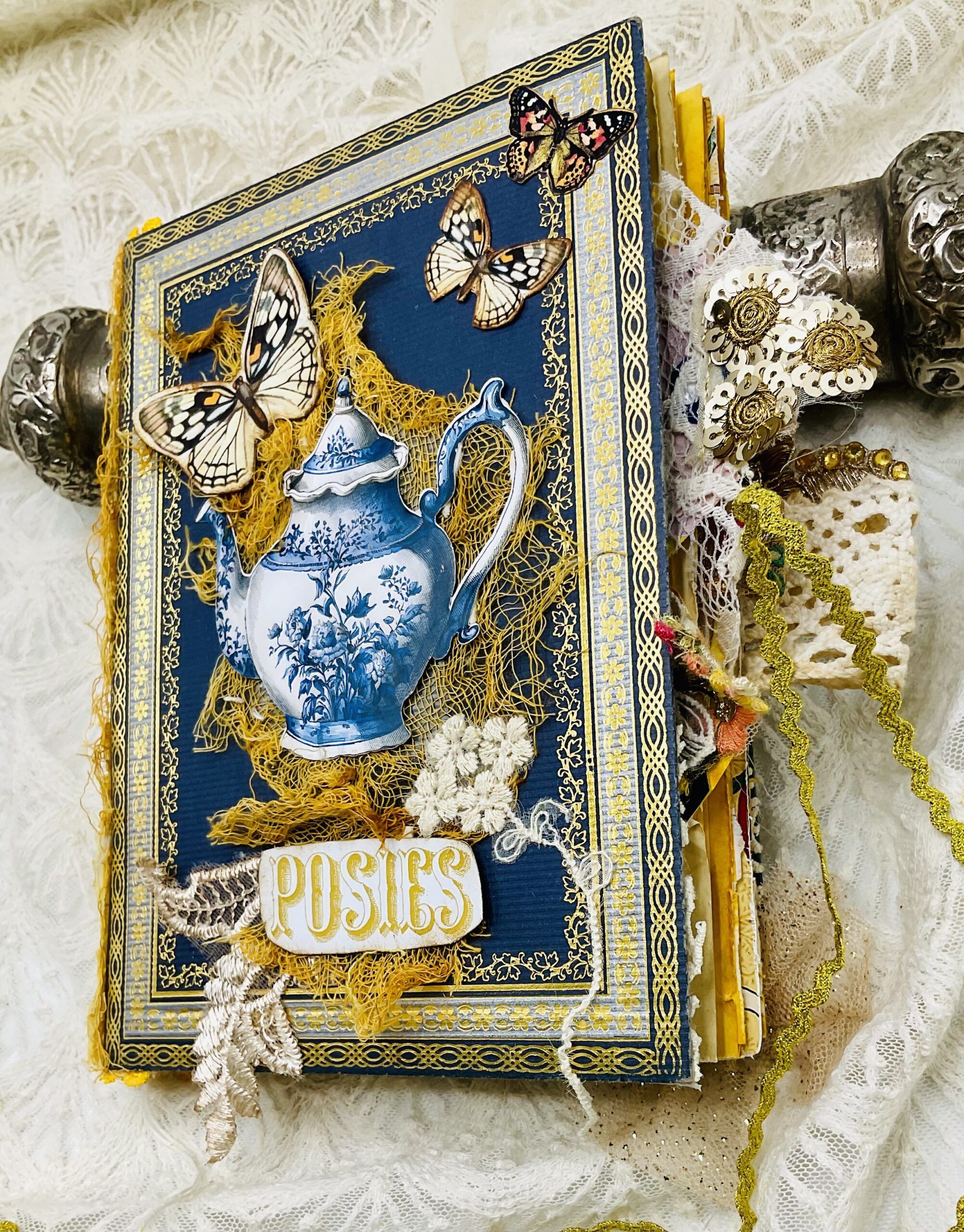 Supplies and materials used to create handmade Chinoiserie junk journal