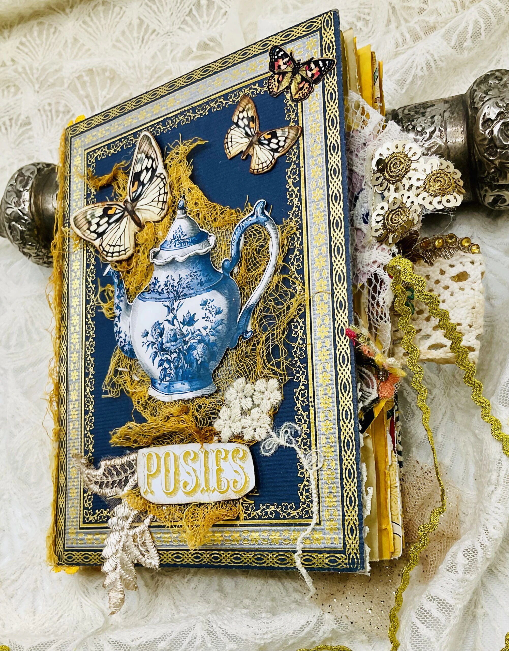 Supplies and materials used to create handmade Chinoiserie junk journal
