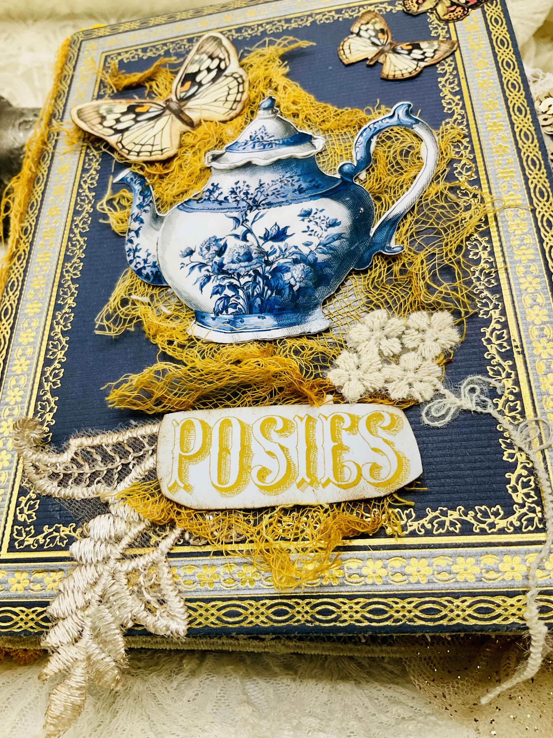 Pockets and tuck spots in handmade junk journal for storing journal cards and notes