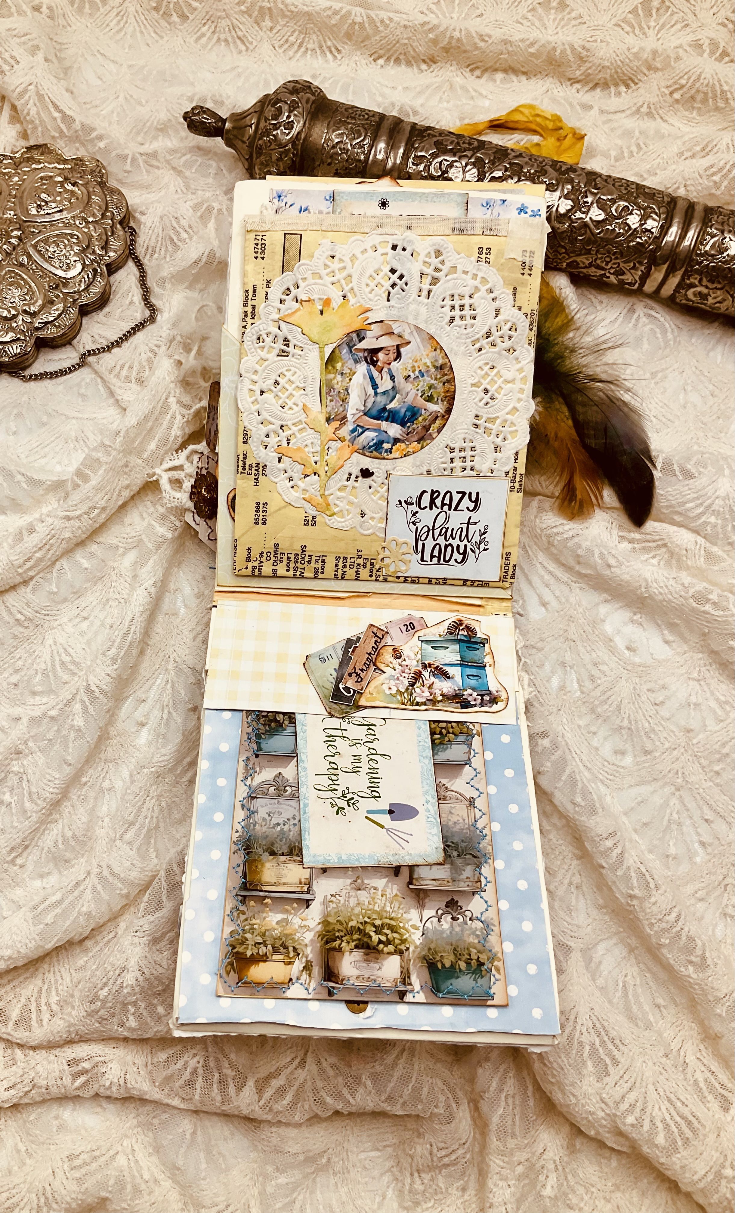 Tea-dyed pages inside Seed Packet Junk Journal with warm golden tones and botanical imagery