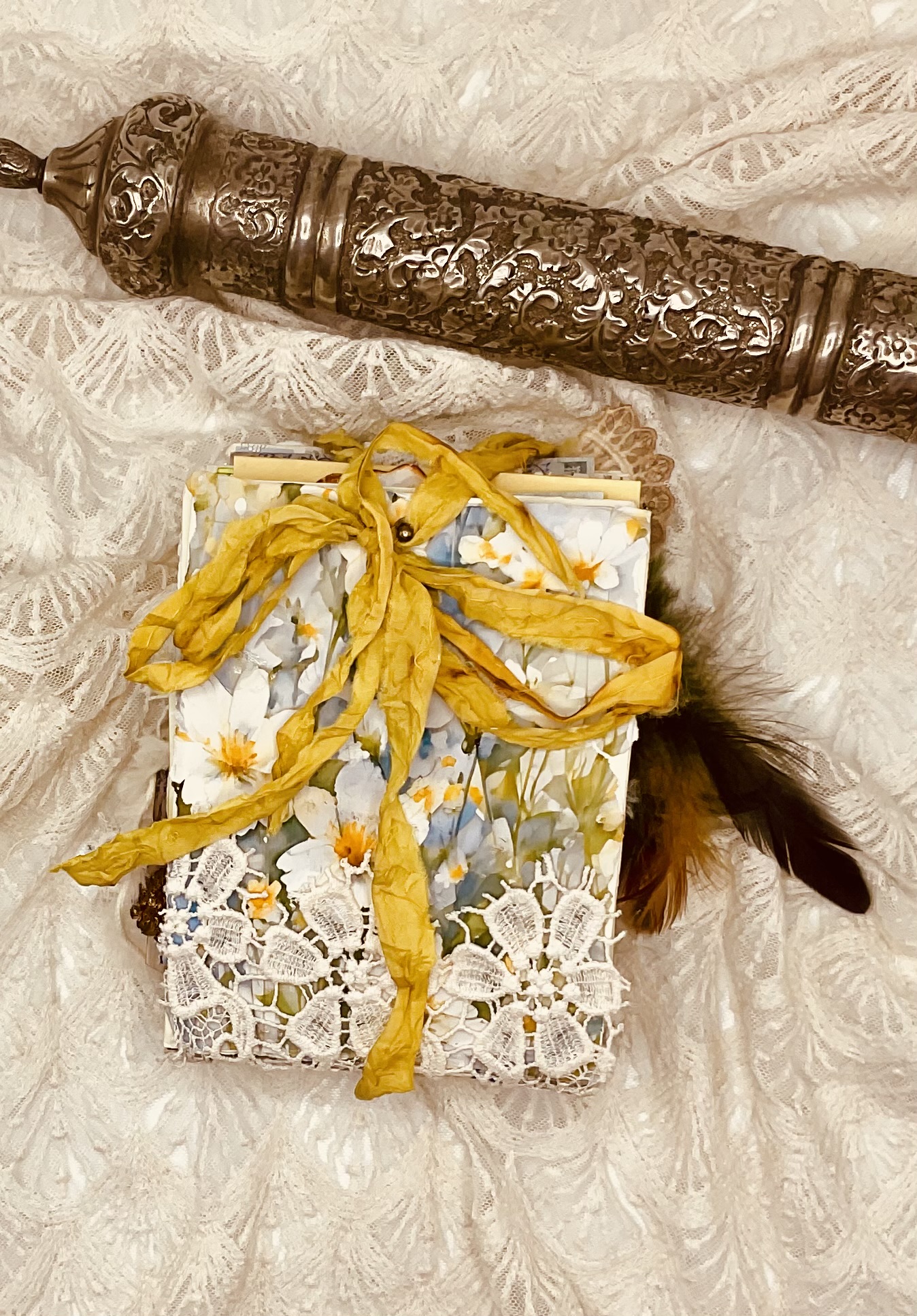 Detailed view of handmade seed packets showing construction, botanical papers, and interactive features