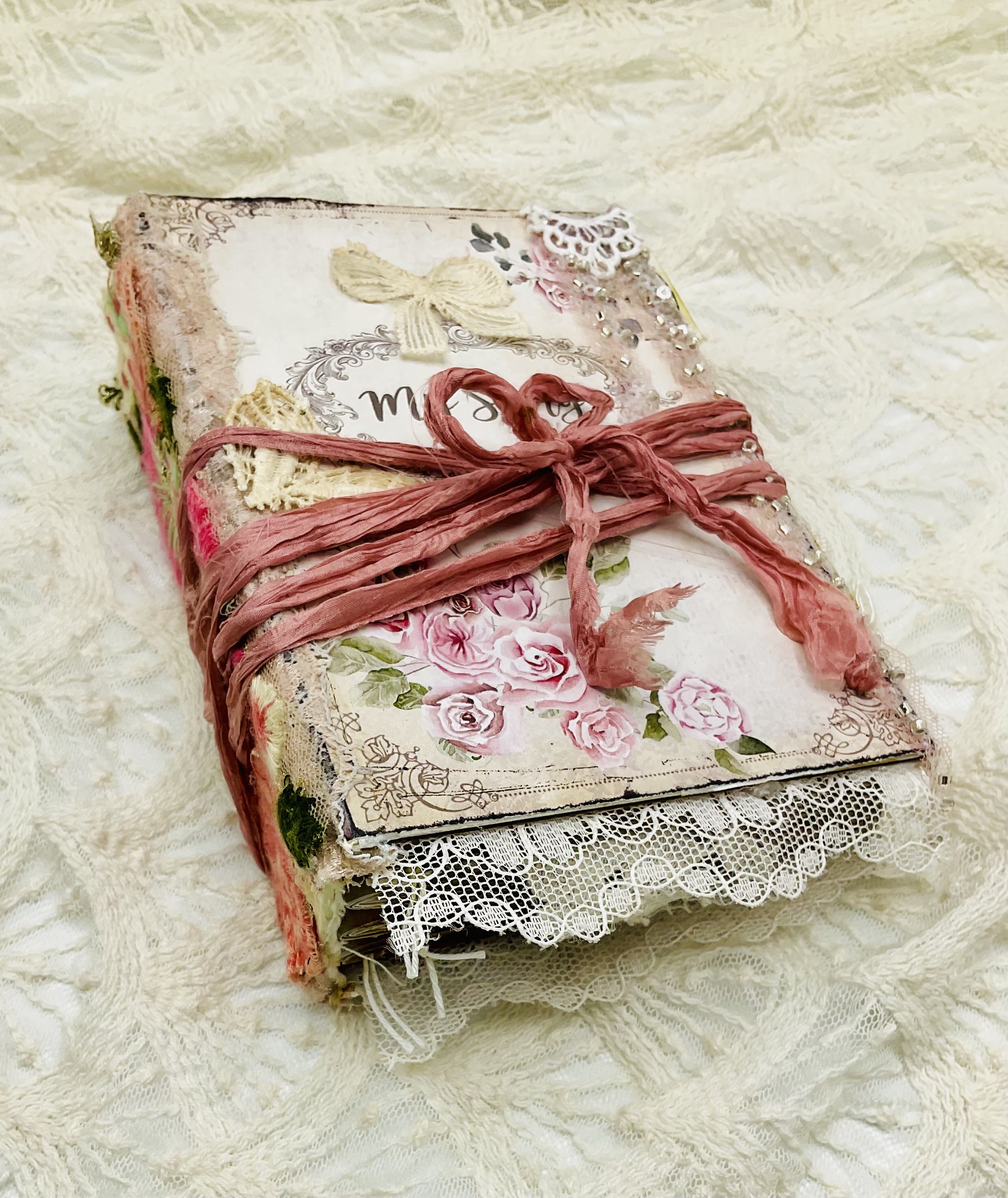 Completed spread from Seed Packet Junk Journal showing botanical ephemera and layered journal elements