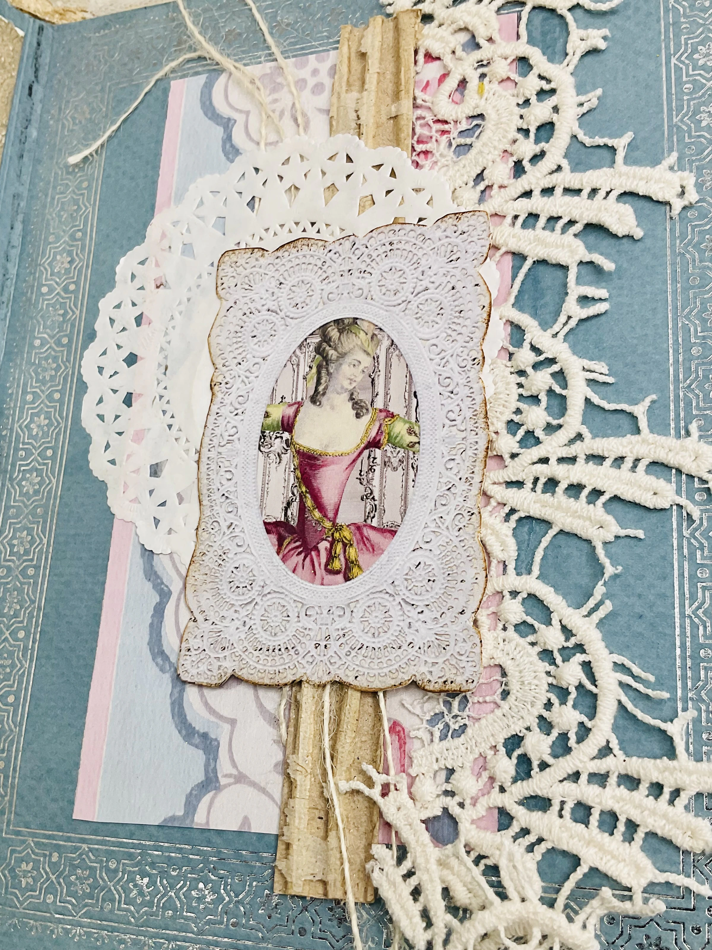 Special handmade junk journal feature with embossed invitation pocket