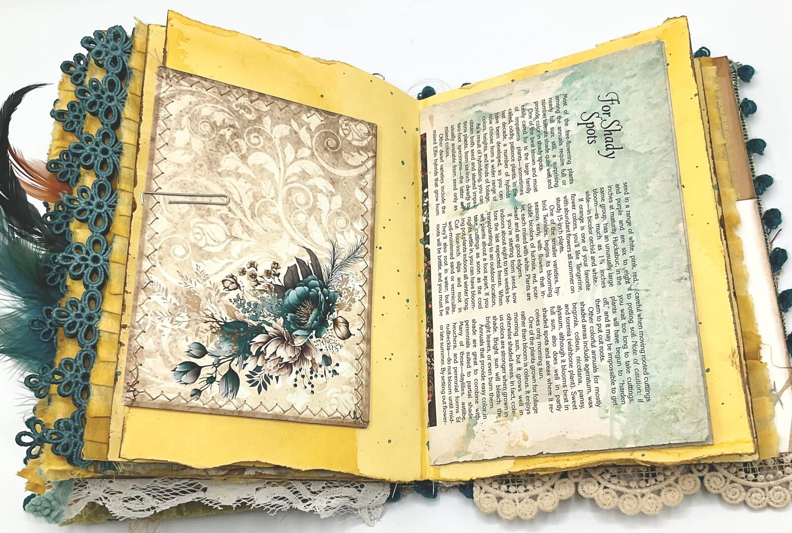 Gold embroidery trim on teal fabric junk journal