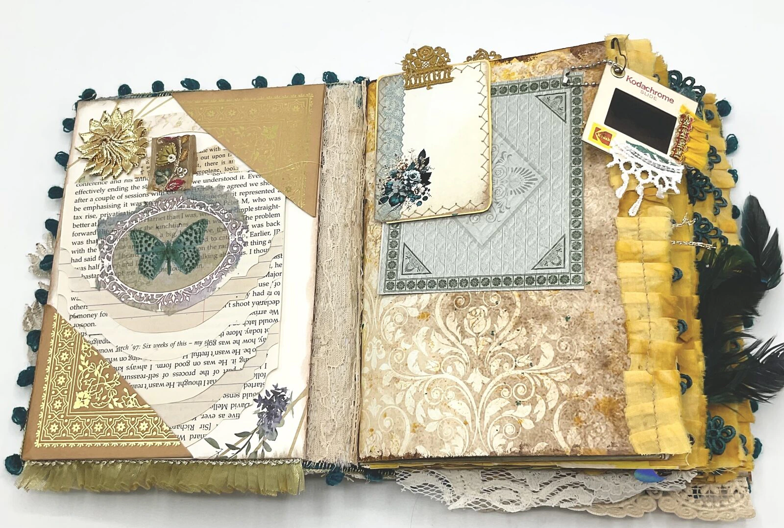 Hidden paper clip in teal fabric junk journal
