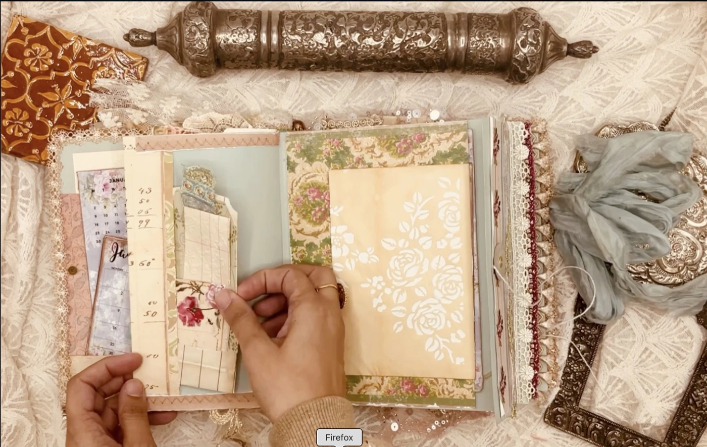 Materials flatlay for the vintage blue envelope junk journal